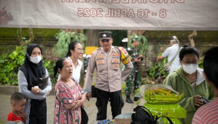 Bhabinkamtibmas dan Babinsa Kawal Kegiatan Pasar Murah di Jaba Pura Dalem Desa Adat Yangbatu