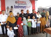 TB INTERPOL Rayakan HUT ke 18 dengan Santunan Yatim Piatu, Tumpengan, dan Hiburan Rakyat di Denpasar