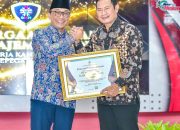 Pemkab Lamongan Menerima Penghargaan Manajemen Kenaikan Pangkat Terbaik II