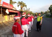 Kapolsek Pekutatan Hadiri Gerak Jalan Pelajar: Rayakan Kemerdekaan dengan Semangat dan Kebersamaan