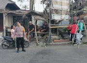 Serentak di Sejumlah Wilayah, Bhabinkamtibmas Polsek Dentim Bersinergi dengan Pemerintah Desa dalam Jumat Bersih